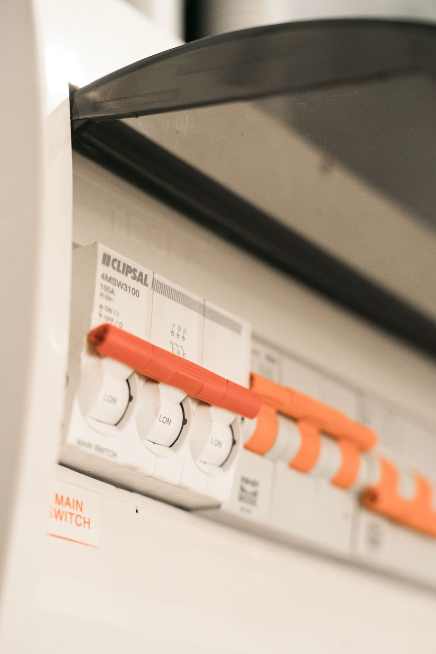 Close-up of circuit breakers inside a modern electrical panel